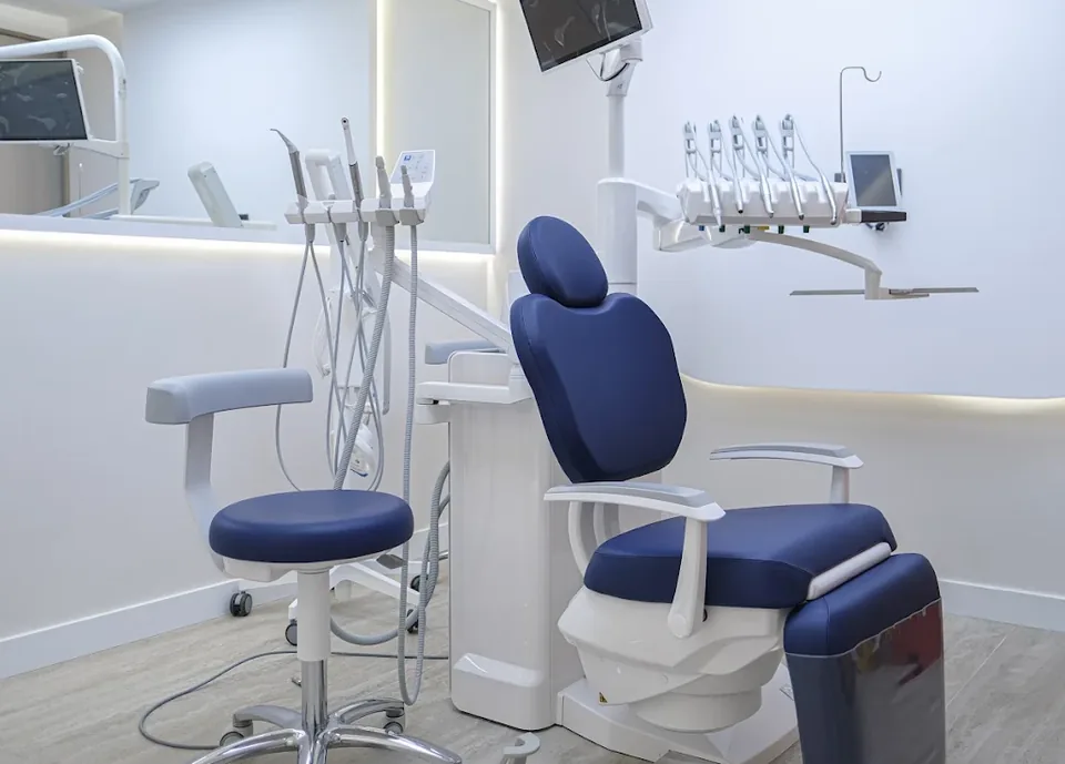 MedArtHair treatment room with blue procedure chair and modern medical equipment
